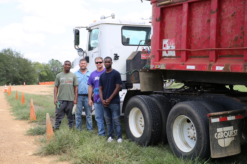 East Mississippi Community College’s Commercial Truck Driving program student Ronald Gore of Columbus, Chris Lovelace of Webster County, program instructor Mark Dodson, and student Montavious Walker stand beside a dump truck donated by Phillips Contracting. Commercial Truck Driving will now include training on the use of construction equipment. East Mississippi Community College’s Commercial Truck Driving program student Ronald Gore of Columbus, Chris Lovelace of Webster County, program instructor Mark Dodson, and student Montavious Walker stand beside a dump truck donated by Phillips Contracting. Commercial Truck Driving will now include training on the use of construction equipment.